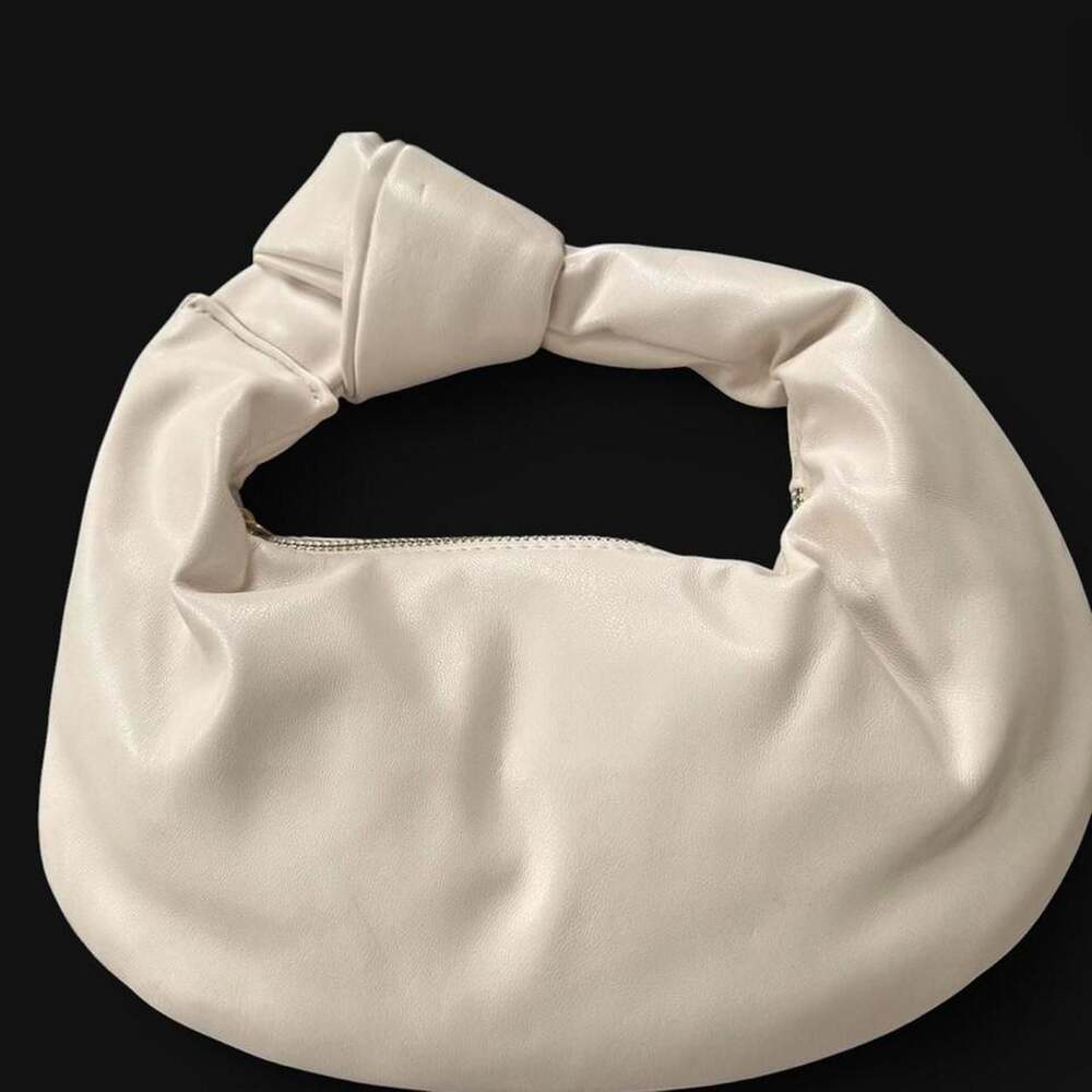 Melie Bianco Cream Knotted Handle Clutch Bag